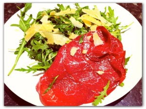 bresaola and rocket salad on a plate