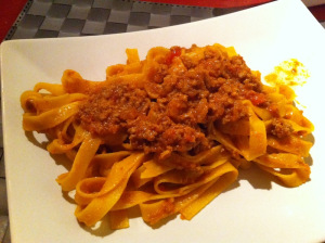 serve tagliatelle with ragu alla bolognese