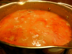 add tomato sauce to cooked mixture